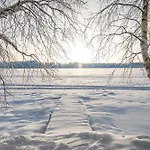 Kalliorinne - Lakefront Villa Rukatunturi